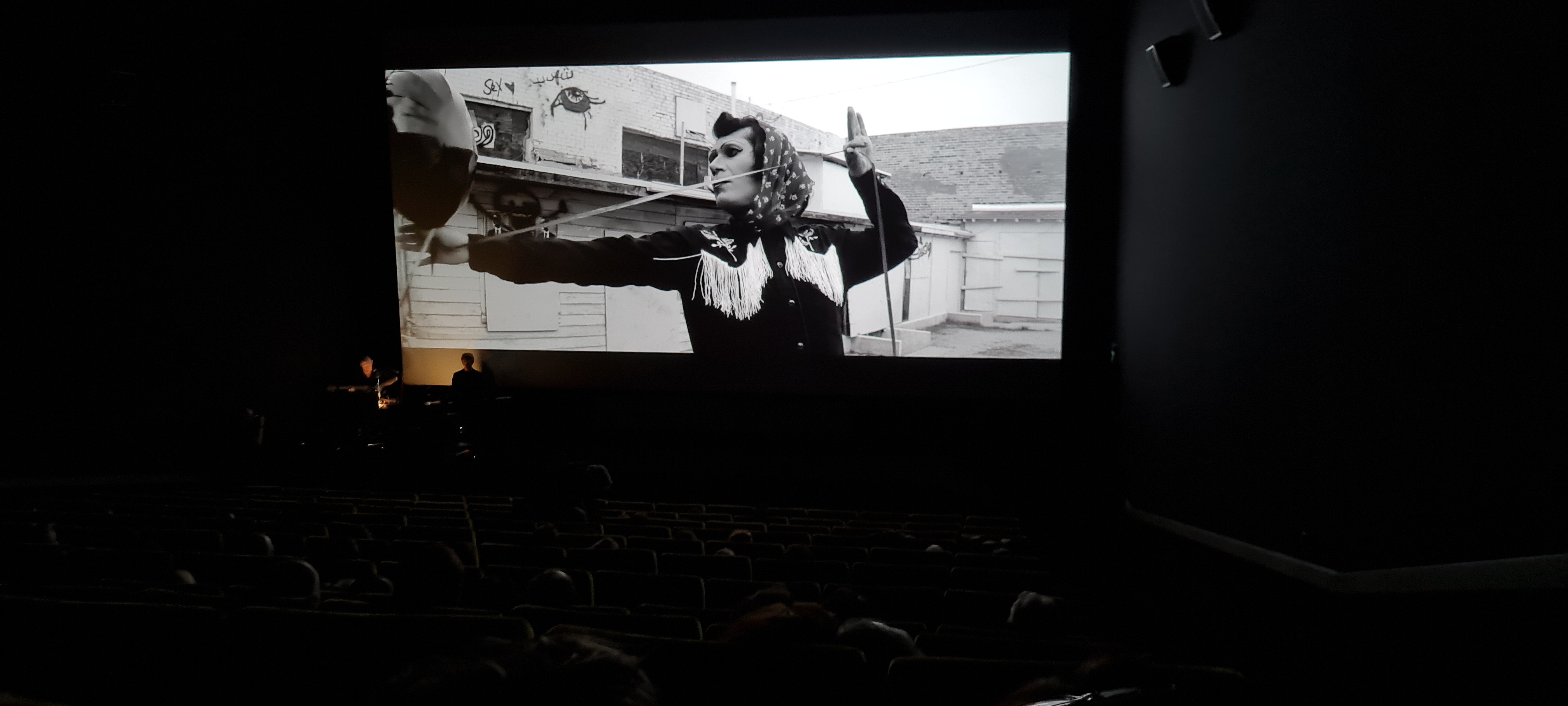 A GIRL WALKS HOME ALONE AT NIGHT 